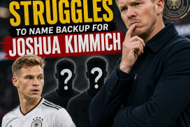 Julian Nagelsmann with a concerned expression during a press conference about Germany's midfield options.