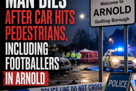 Emergency responders attend to injured pedestrians on a street after a crash in Arnold involving a car and footballers.