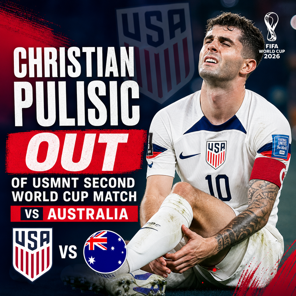 Christian Pulisic sitting on the field clutching his knee, injured during the USMNT match against Australia in FIFA World Cup