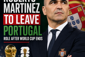 Roberto Martinez in a suit speaking on a football field with players in the background.