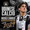 Nicolò Zaniolo in Udinese Calcio jersey celebrating his permanent signing until 2029.