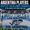 Argentina soccer players celebrate their World Cup semi-final win, holding a banner referencing the Falklands.