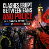Police in riot gear confront football fans near Big Ben in London during post-match clashes after France vs Morocco game.