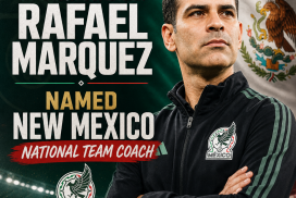 Rafael Marquez in a suit speaking at a press conference as new New Mexico national team coach.