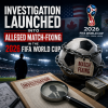 Officials reviewing documents and footage during an investigation into alleged 2026 FIFA World Cup match-fixing.