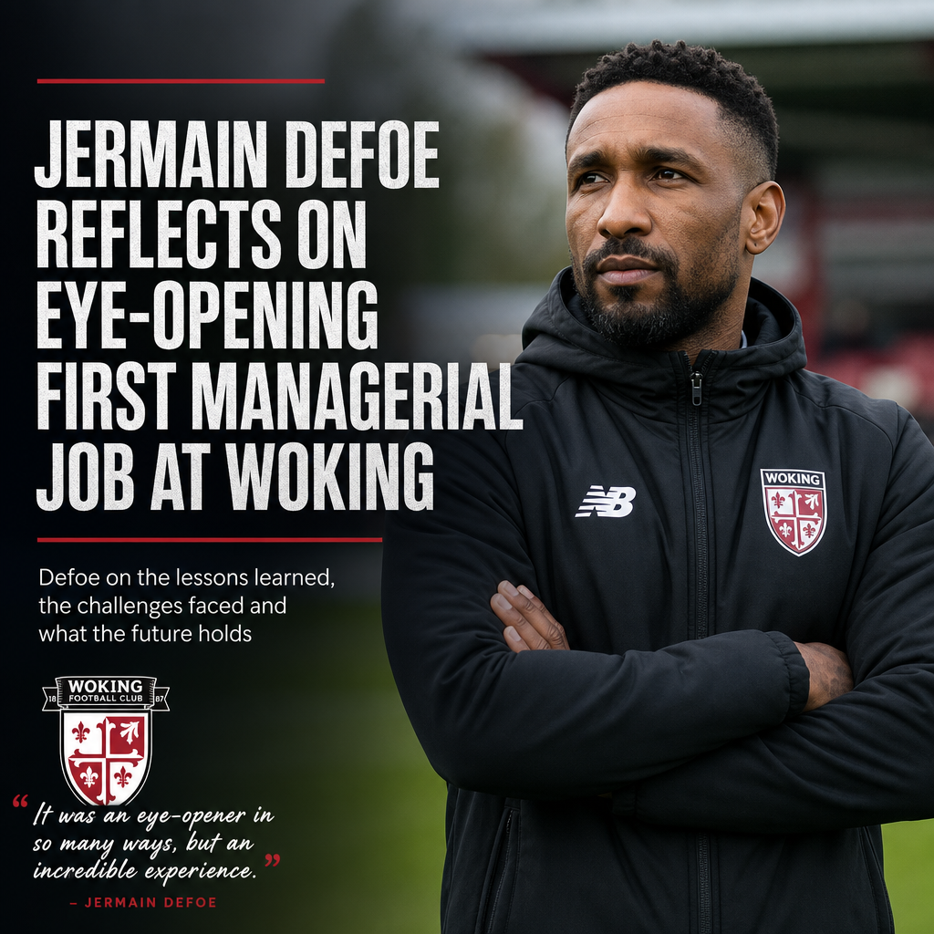 Jermain Defoe speaking thoughtfully during an interview about his first managerial role at Woking Football Club.