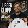 Jurgen Klopp in a suit smiling confidently, new head coach of Germany's national football team in 2024.