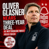Oliver Glasner poses confidently in a suit, nearing a three-year deal as Nottingham Forest head coach.