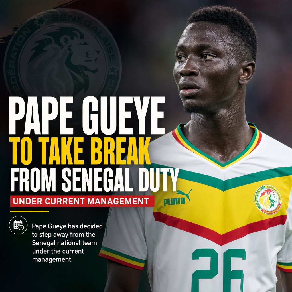 Pape Gueye holds a Senegal jersey, announcing a break from the national football team under current management.