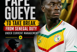 Portrait of footballer Pape Gueye wearing a Senegal national team jersey.