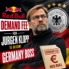 Jurgen Klopp speaking at a press conference with Red Bull and Germany football logos nearby.