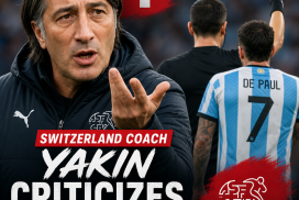 Switzerland coach Hakan Yakin reacts angrily during a football match against Argentina.