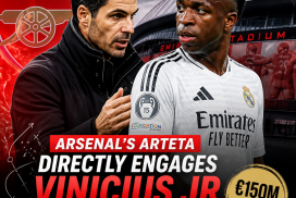 Mikel Arteta and Vinicius Jr face each other intensely during a football match, highlighting transfer interest.