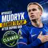Chelsea winger Mykhailo Mudryk celebrates a goal on the field wearing blue kit.