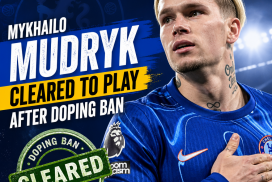Chelsea winger Mykhailo Mudryk celebrates a goal on the field wearing blue kit.