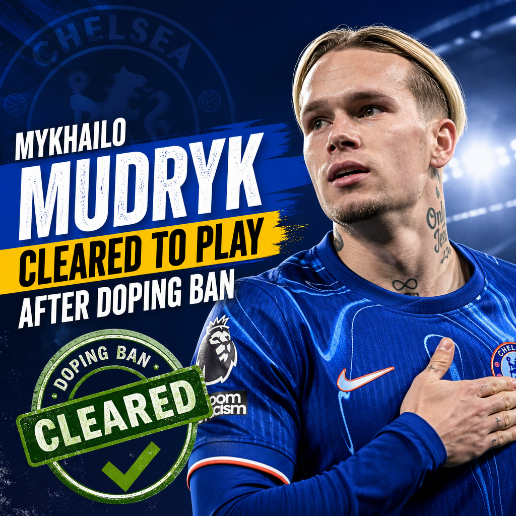Chelsea winger Mykhailo Mudryk celebrates a goal on the field wearing blue kit.