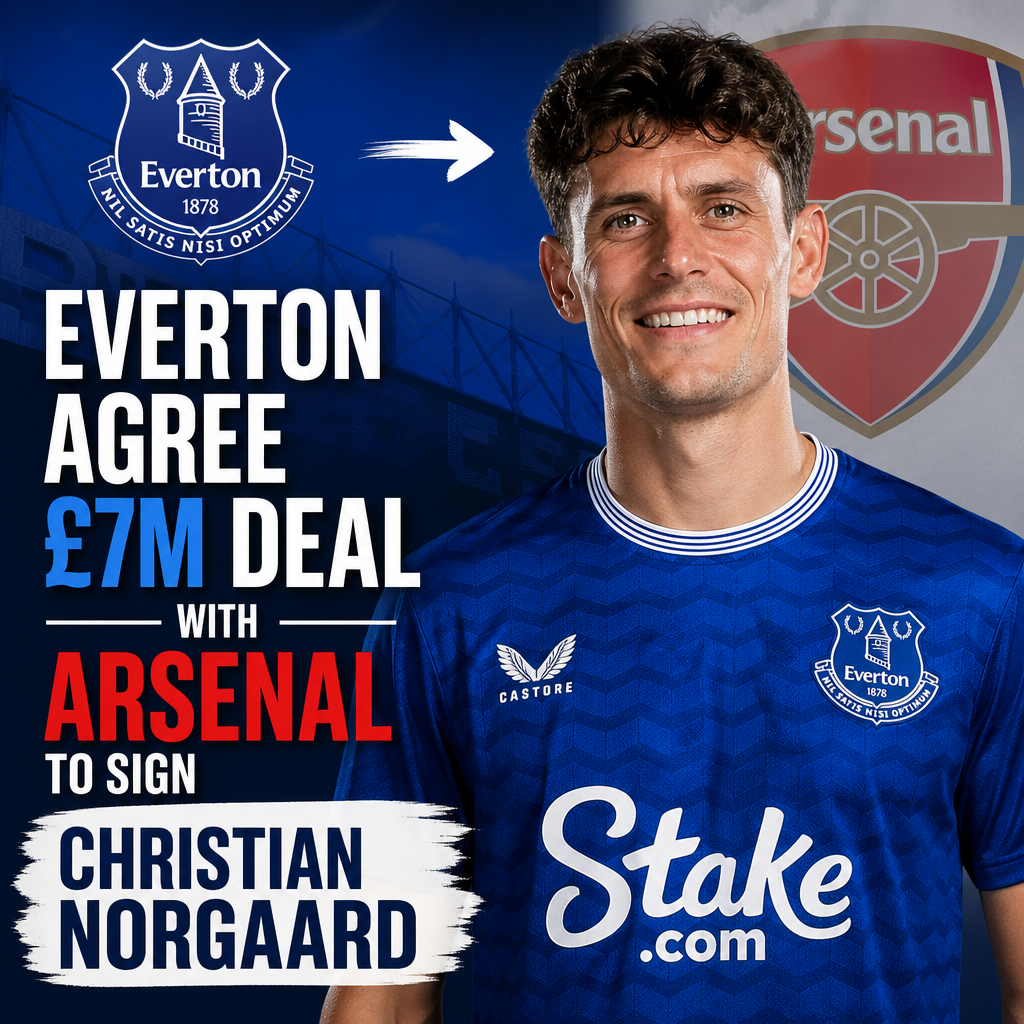 Christian Norgaard in blue Everton kit celebrates on the field after signing from Arsenal.