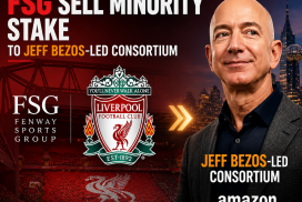 Liverpool owners Fenway Sports Group shaking hands with Jeff Bezos-led consortium in a business setting.