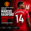 Marcus Rashford in Manchester United kit holding up the number 14 shirt with club emblem.