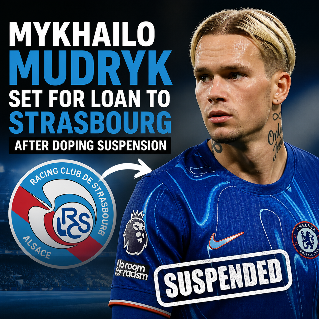 Mykhailo Mudryk in Chelsea kit, walking on pitch, linked to loan move to Strasbourg after doping suspension.