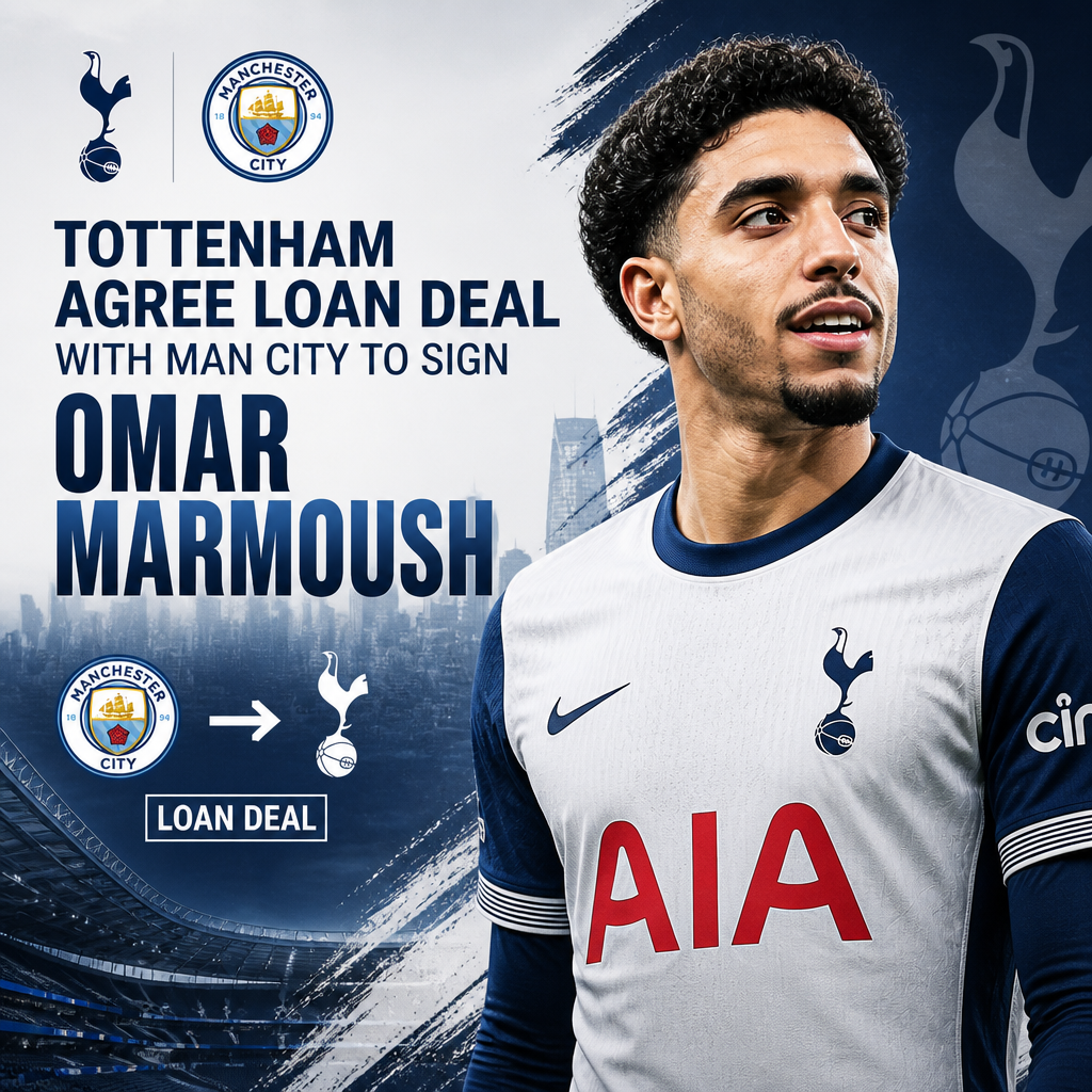 Omar Marmoush in Tottenham Hotspur kit celebrating a goal during a football match.