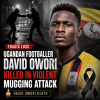 Portrait of Ugandan footballer David Owori smiling, wearing a sports jacket.