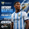 Anthony Martial in Malaga CF jersey celebrating on the football field after joining as a free agent.