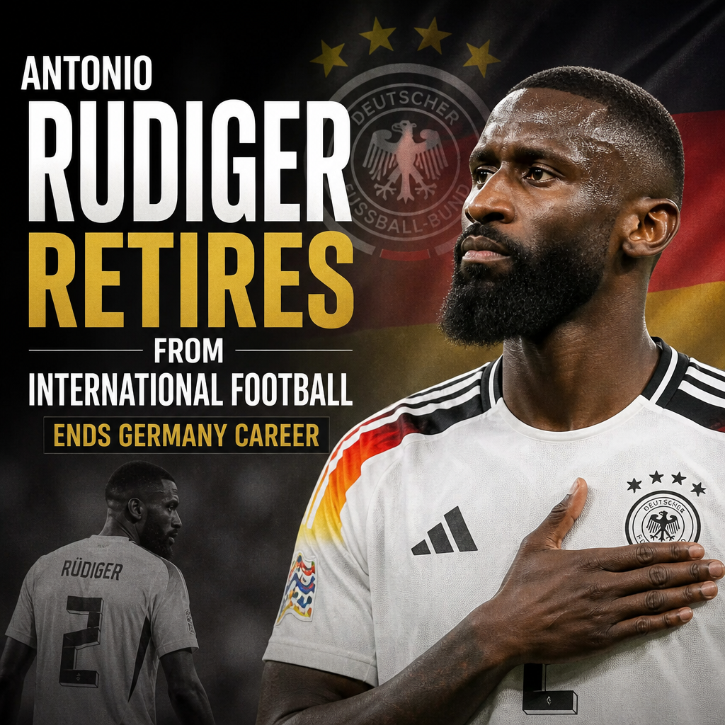 Antonio Rudiger in a Germany jersey, speaking at a press conference announcing his international retirement.