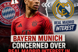 Bayern Munich officials looking concerned during a press conference about Real Madrid's interest in Michael Olise.
