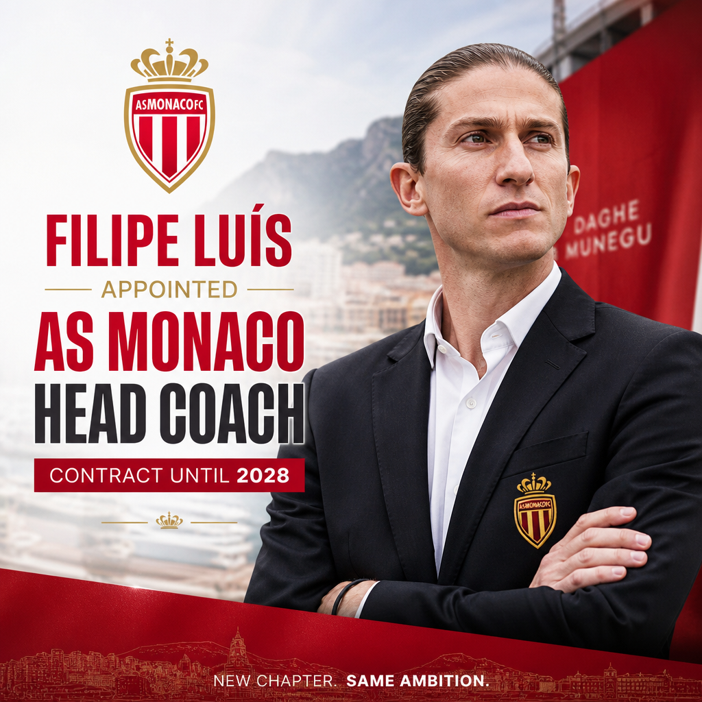 Filipe Luís stands on the pitch in an AS Monaco jacket, smiling after being appointed head coach until 2028.