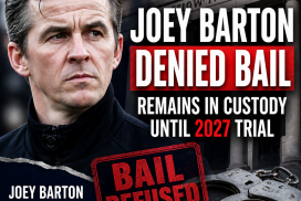 Joey Barton in a police custody setting, looking serious and wearing a dark jacket.