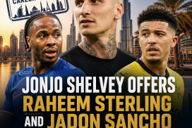 Jonjo Shelvey talks with Raheem Sterling and Jadon Sancho with Dubai skyline behind them.