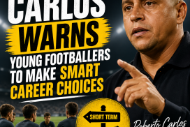 Roberto Carlos speaking into a microphone, emphasizing smart career choices to young footballers.