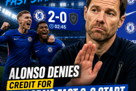 Chelsea players celebrating after scoring two early goals while Alonso stays composed on the pitch.