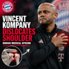Vincent Kompany grimacing in pain while medical staff assist with his dislocated shoulder at FC Bayern München.