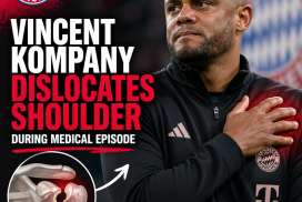 Vincent Kompany grimacing in pain while medical staff assist with his dislocated shoulder at FC Bayern München.