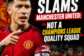 Lisandro Martinez passionately speaking during a press conference, criticizing Manchester United's Champions League quality.