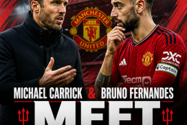 Michael Carrick and Bruno Fernandes discuss tactics on the sidelines at Old Trafford during a Manchester United match.