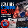 FC Copenhagen players and fans with flares at Parken Stadium, highlighting UEFA fine for pyrotechnics.