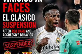 Vinicius Jr shows a frustrated expression after receiving a red card, risking suspension for El Clásico match.