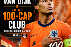 Virgil van Dijk in Netherlands kit celebrating after reaching 100 international caps as captain versus Serbia.